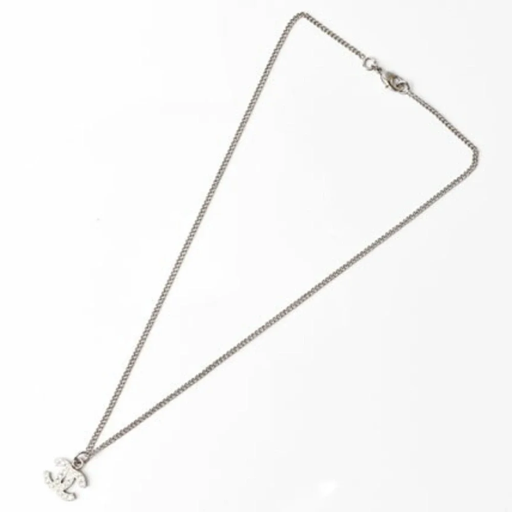 CHANEL Authentic White Logo Necklace